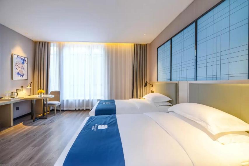 Echarm Hotel Ji'Nan Railway Station Jinan Bagian luar foto